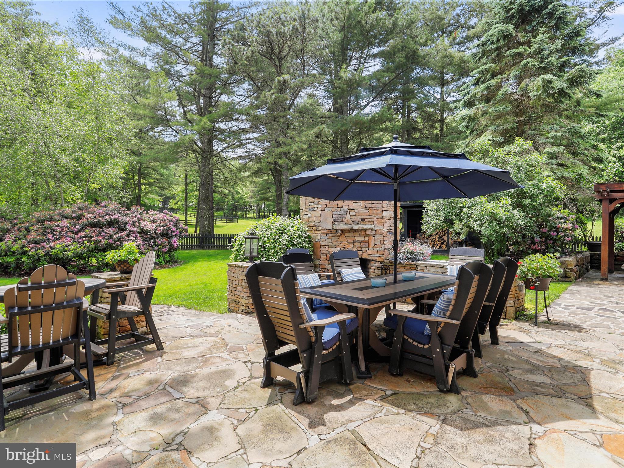 1240 Boy Scout Road Oakland, MD 21550 - Photo 69 of 148 a view of backyard with outdoor seating a patio and plants