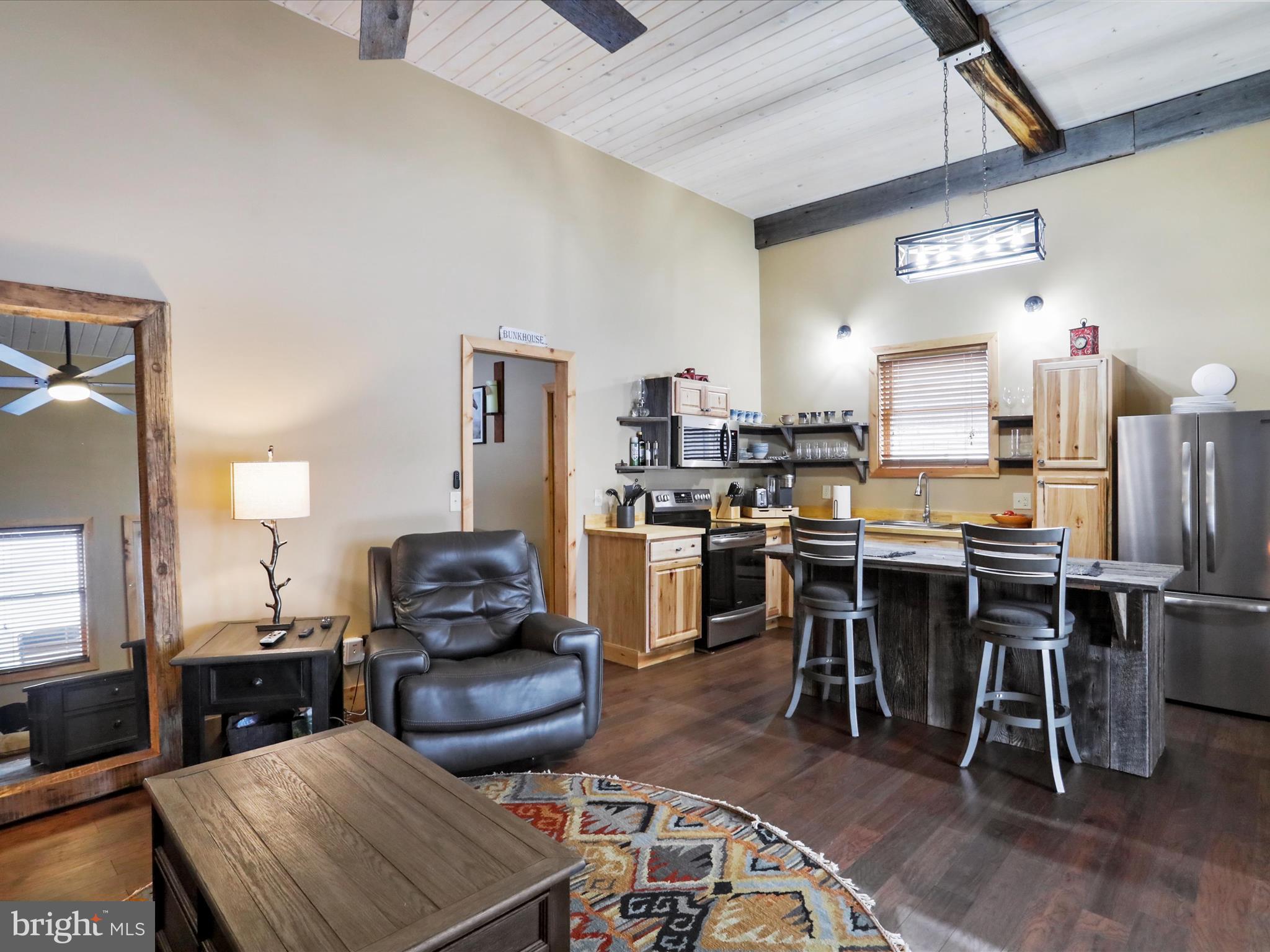 1240 Boy Scout Road Oakland, MD 21550 - Photo 86 of 148 a living room with furniture and a kitchen view