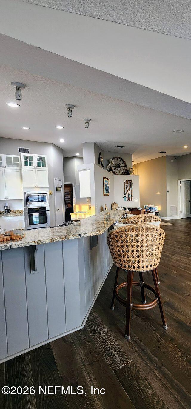 16039 Shellcracker Road Jacksonville, FL 32226 - Photo 14 of 39 a large kitchen with a table and chairs