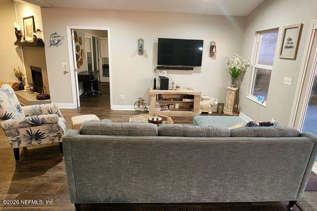 16039 Shellcracker Road Jacksonville, FL 32226 - Photo 16 of 39 a living room with furniture and a flat screen tv