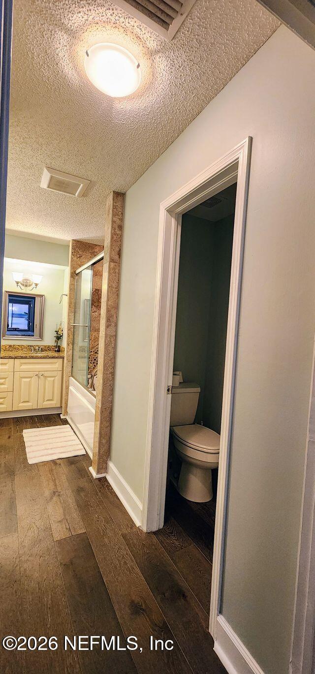 16039 Shellcracker Road Jacksonville, FL 32226 - Photo 26 of 39 a view of a hallway to a livingroom with furniture