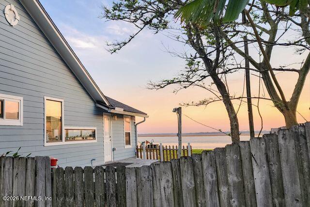 16039 Shellcracker Road Jacksonville, FL 32226 - Photo 34 of 39 a front view of a house with wooden fence