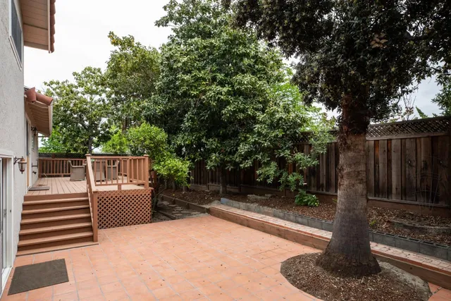 a view of backyard with green space