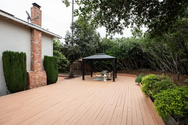 a view of outdoor space yard deck patio and outdoor kitchen