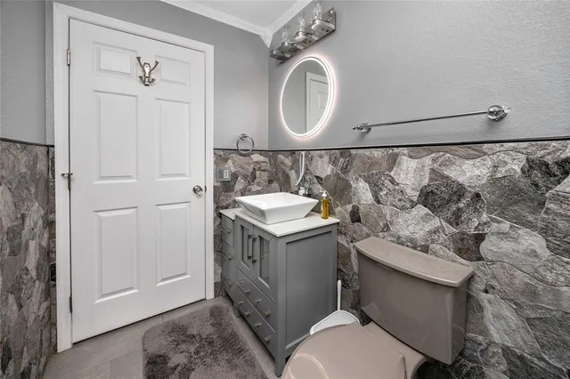 a view of back yard of the house with a yard