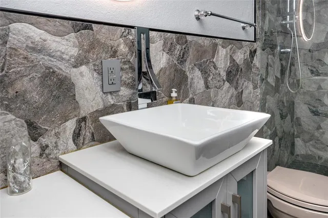 a front view of house with a yard and a garage