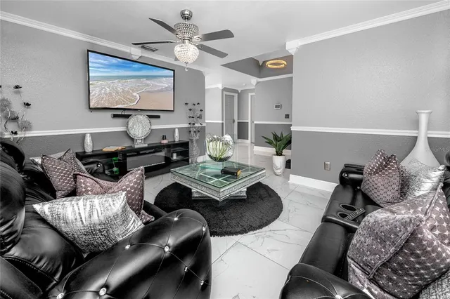 a kitchen with stainless steel appliances kitchen island granite countertop a sink and cabinets