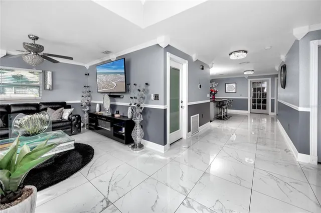 a kitchen with kitchen island granite countertop lots of counter top space and stainless steel appliances