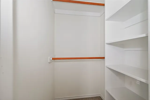 a view of small space with racks on the wall