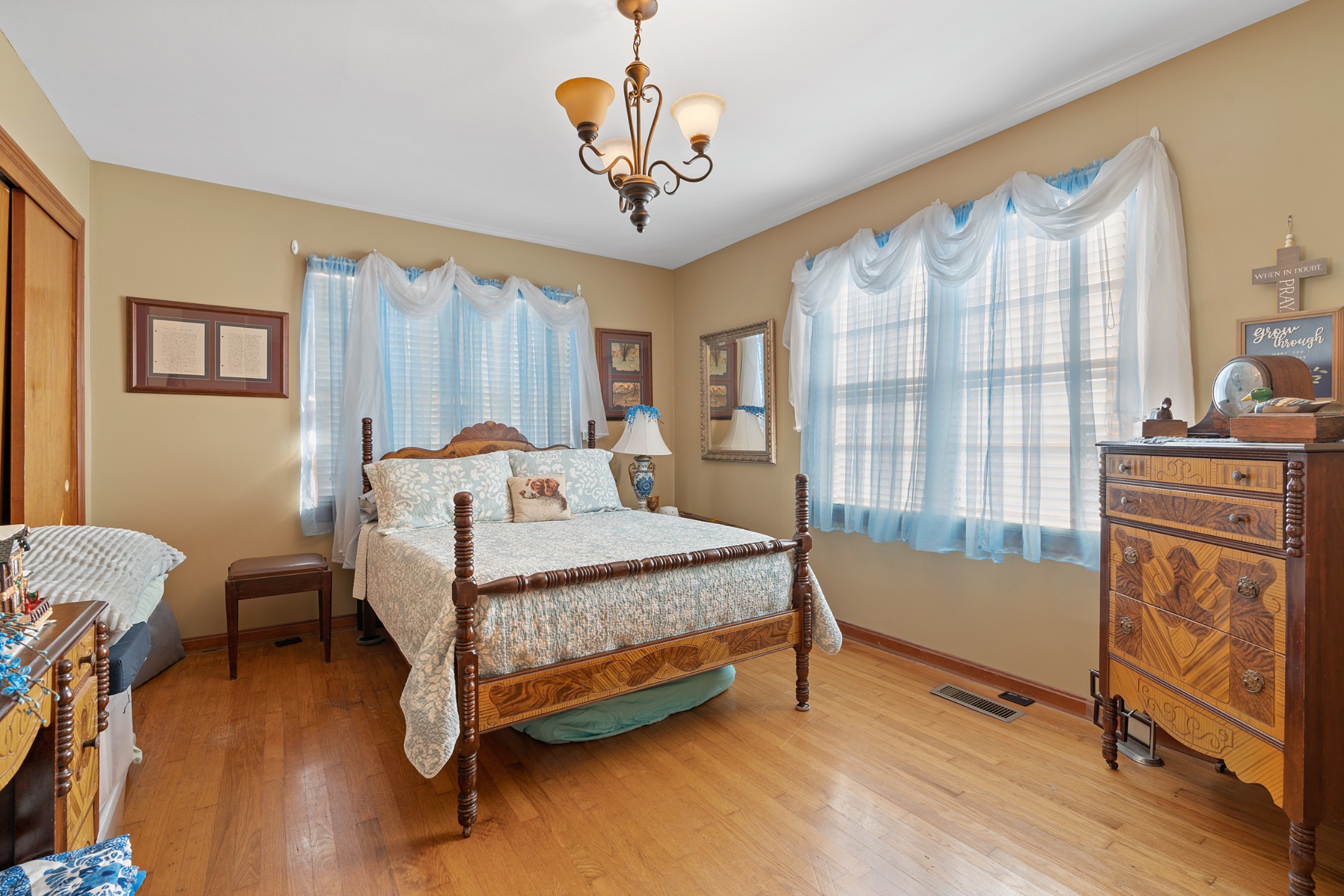 336 Martin-Childers Road New Hope, AL 35760 - Photo 10 of 28 a bedroom with a bed and a chandelier