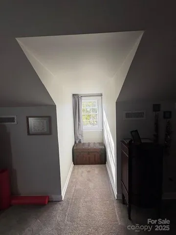 a bathroom with a sink a toilet a shower and a mirror