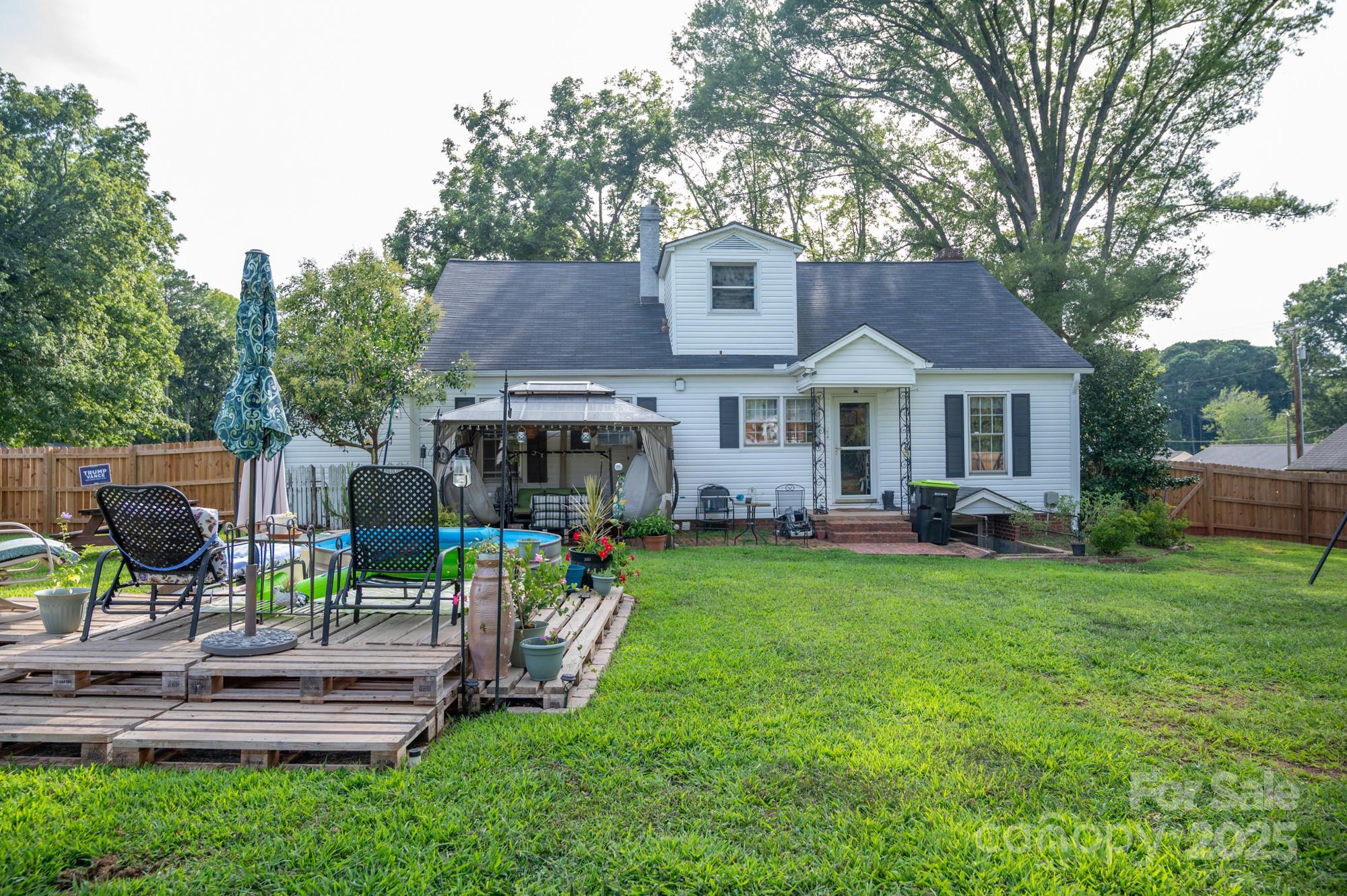 109 Old Rockwell Road China Grove, NC 28023 - Photo 21 of 22 a front view of a house with garden