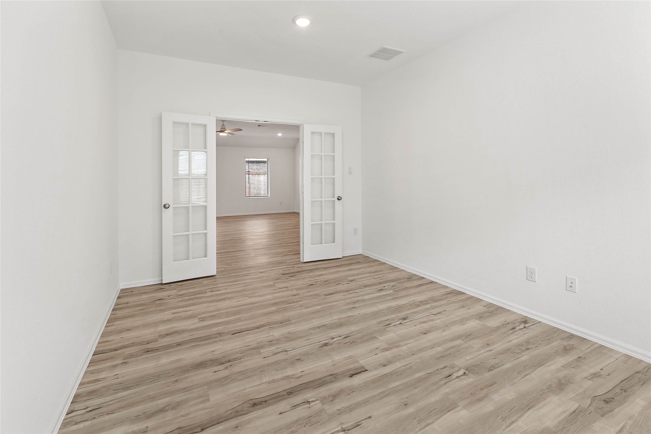 7602 Angels Lndg Lane Porter, TX 77365 - Photo 12 of 32 Located off the living area, French doors offer privacy for this spacious study.