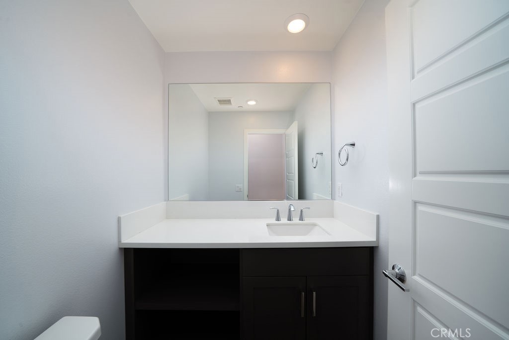 430 Transport Tustin, CA 92782 - Photo 14 of 37 a bathroom with a sink and a mirror