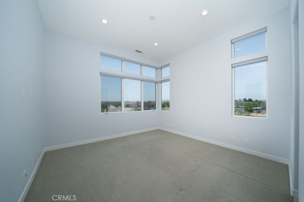 430 Transport Tustin, CA 92782 - Photo 30 of 37 an empty room with entrance and windows