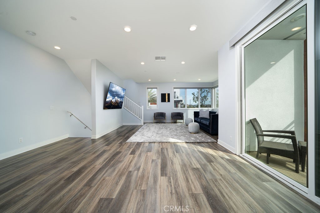430 Transport Tustin, CA 92782 - Photo 33 of 37 a view of a living room with wooden floor