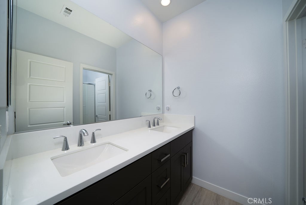 430 Transport Tustin, CA 92782 - Photo 8 of 37 a bathroom with a sink and a mirror