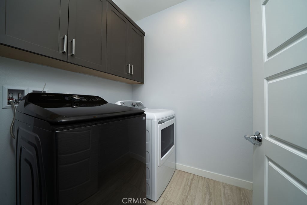 430 Transport Tustin, CA 92782 - Photo 10 of 37 a utility room with dryer and washer