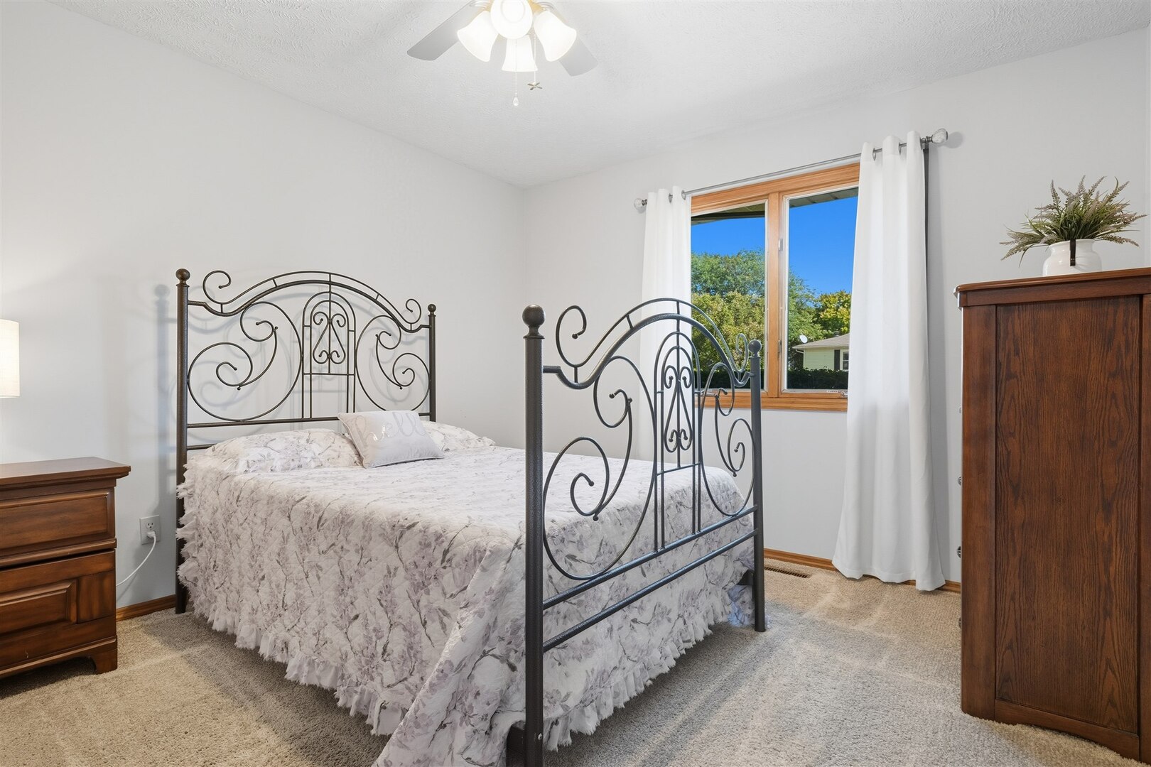 315 Garden Road Normal, IL 61761 - Photo 13 of 32 a bedroom with a bed and a window