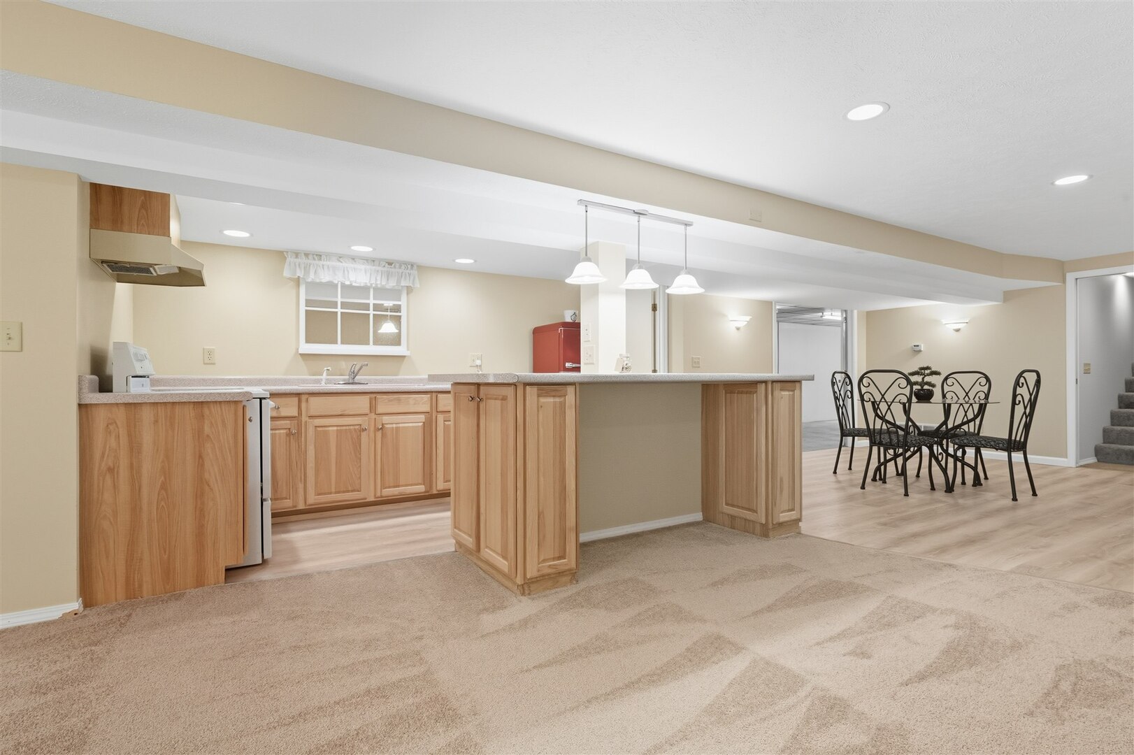 315 Garden Road Normal, IL 61761 - Photo 18 of 32 a view of a kitchen with a table and chairs