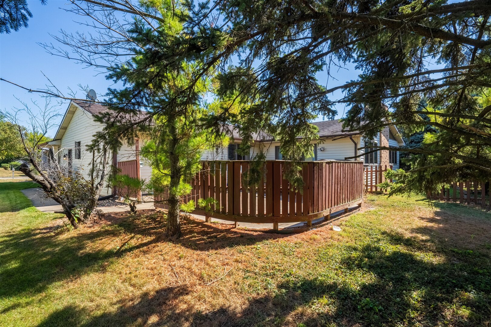 315 Garden Road Normal, IL 61761 - Photo 26 of 32 a view of backyard with wooden fence