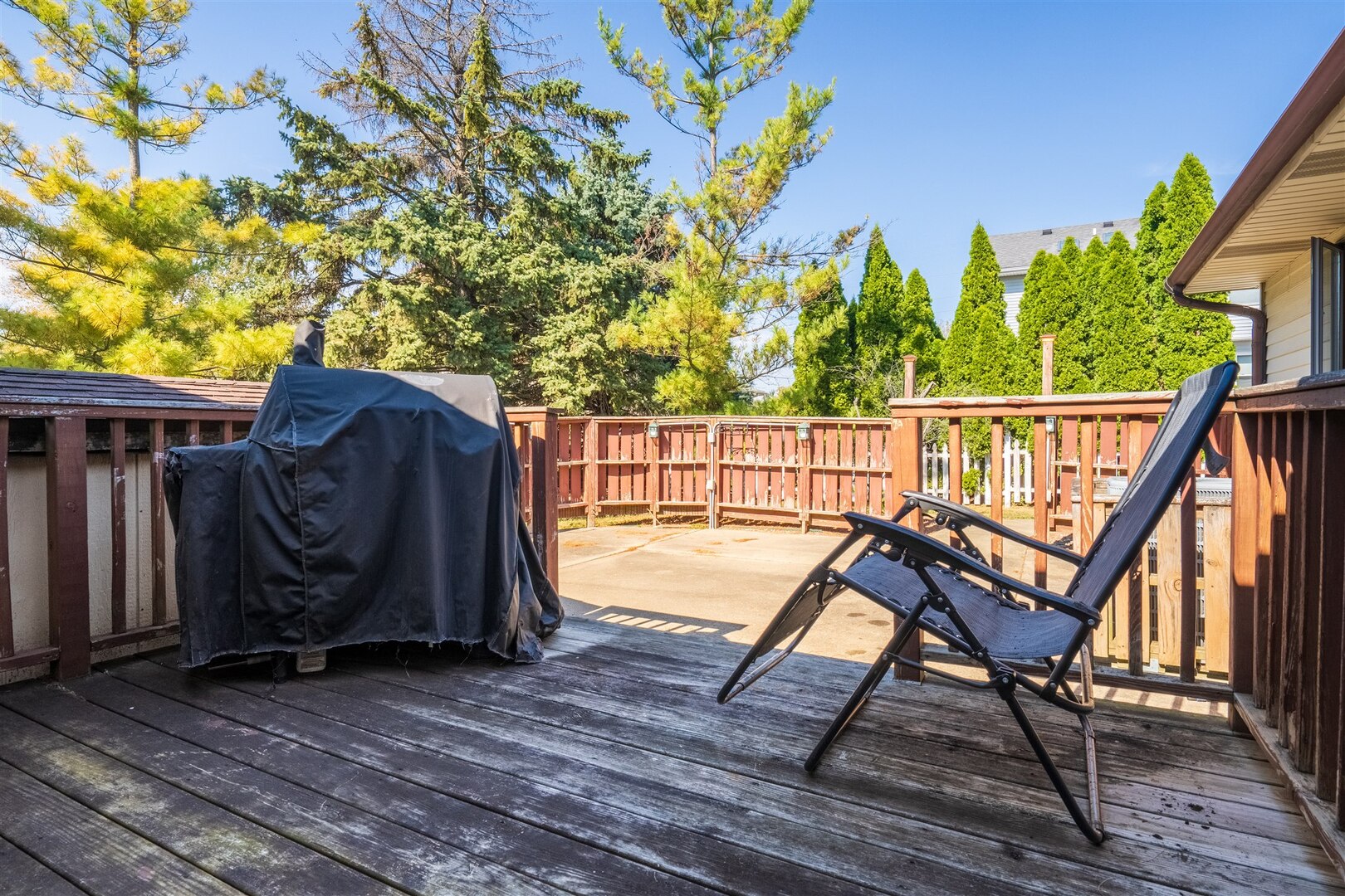 315 Garden Road Normal, IL 61761 - Photo 32 of 32 a view of a roof deck with wooden floor and fence