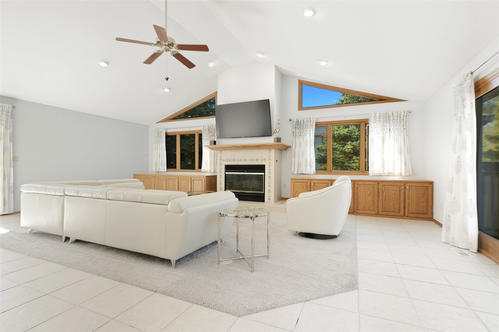 315 Garden Road Normal, IL 61761 - Photo 5 of 32 a living room with furniture fireplace and a flat screen tv