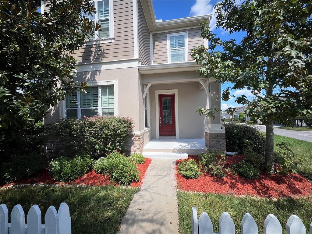 11124 Great Neck Road Riverview, FL 33578 - Photo 2 of 26 a front view of a house having yard