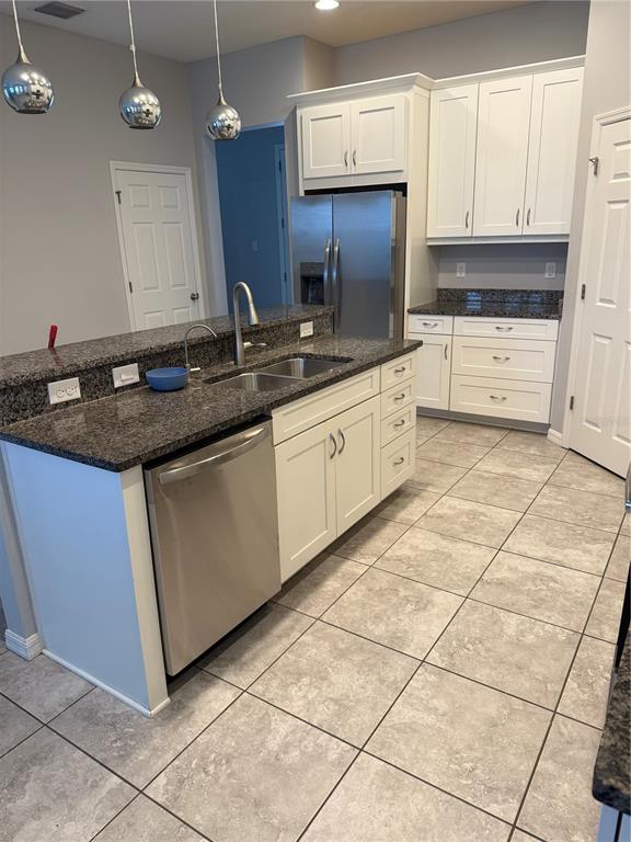 11124 Great Neck Road Riverview, FL 33578 - Photo 5 of 26 a kitchen with a sink and cabinets