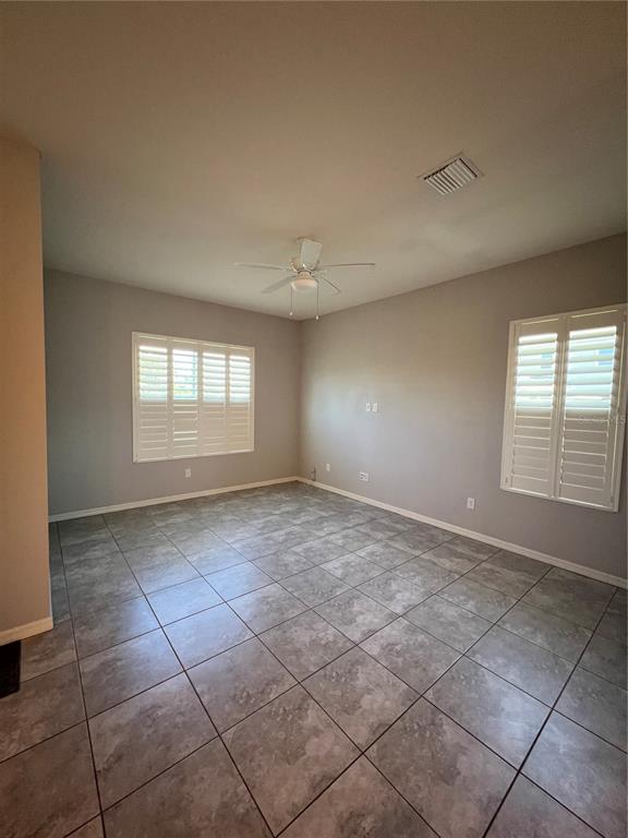 11124 Great Neck Road Riverview, FL 33578 - Photo 10 of 26 a view of an empty room and window
