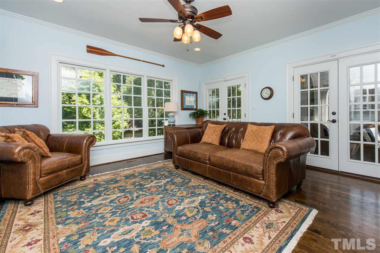 2218 Creston Road Raleigh, NC 27608 - Photo 13 of 25 a living room with furniture and a large window