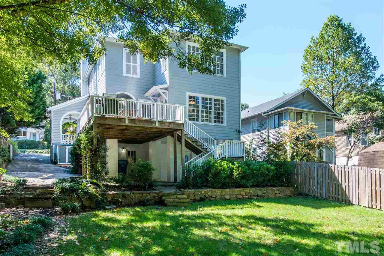 2218 Creston Road Raleigh, NC 27608 - Photo 24 of 25 a front view of a house with garden