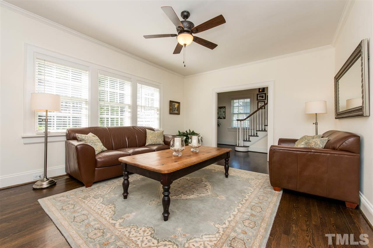 2218 Creston Road Raleigh, NC 27608 - Photo 4 of 25 a living room with furniture and a window