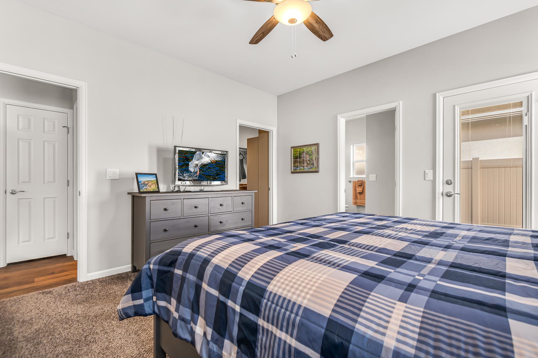 454 Lewis Street Grand Junction, CO 81504 - Photo 14 of 25 a bedroom with a bed and a television