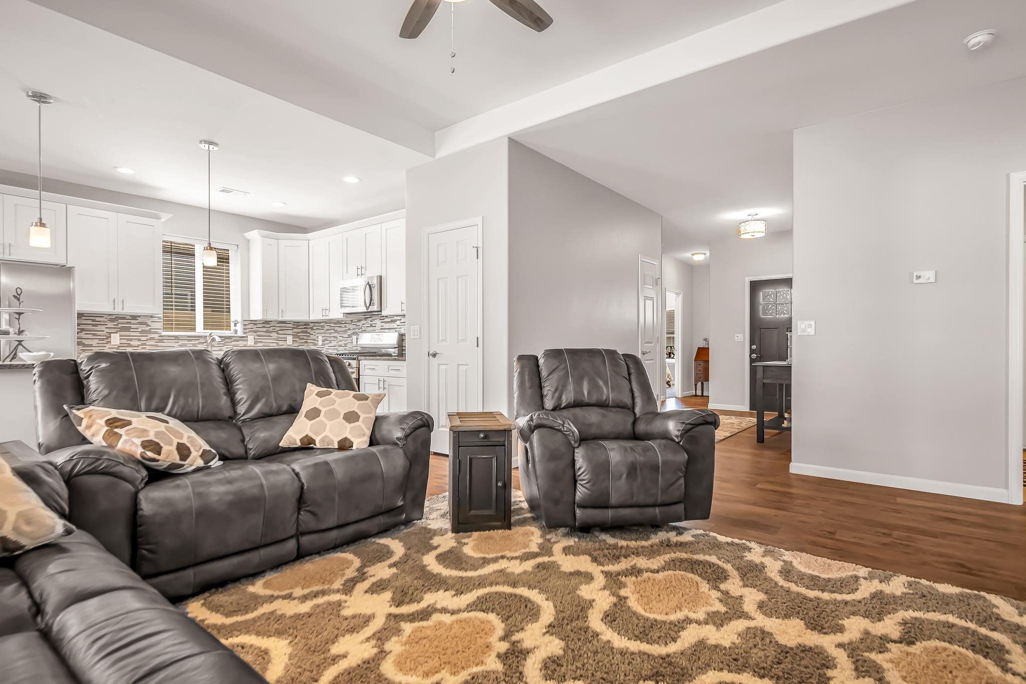 454 Lewis Street Grand Junction, CO 81504 - Photo 4 of 25 a living room with furniture and kitchen view