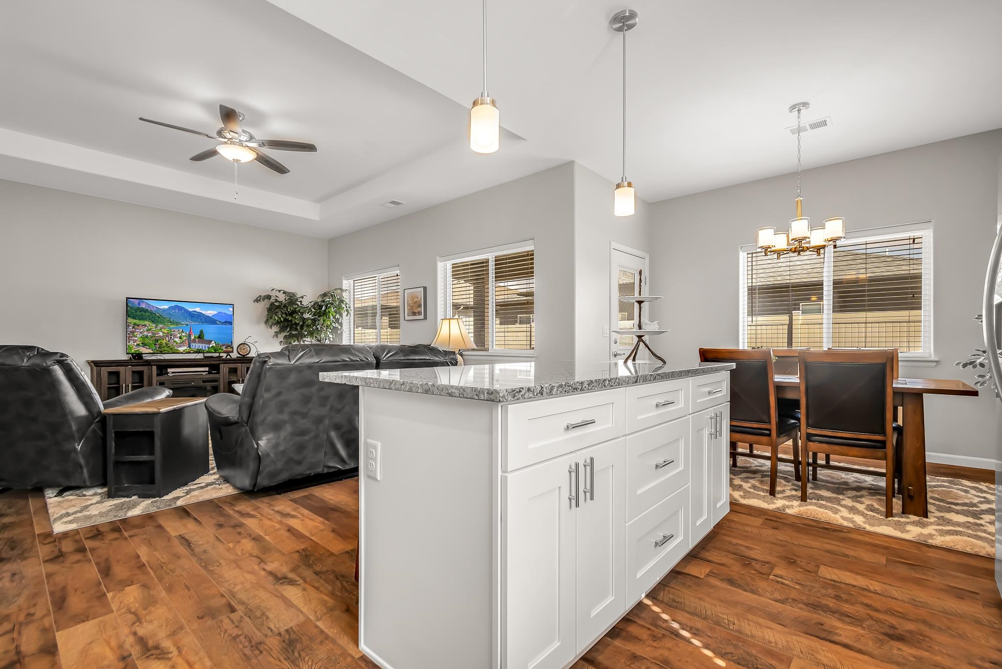 454 Lewis Street Grand Junction, CO 81504 - Photo 5 of 25 a kitchen with living room and stove
