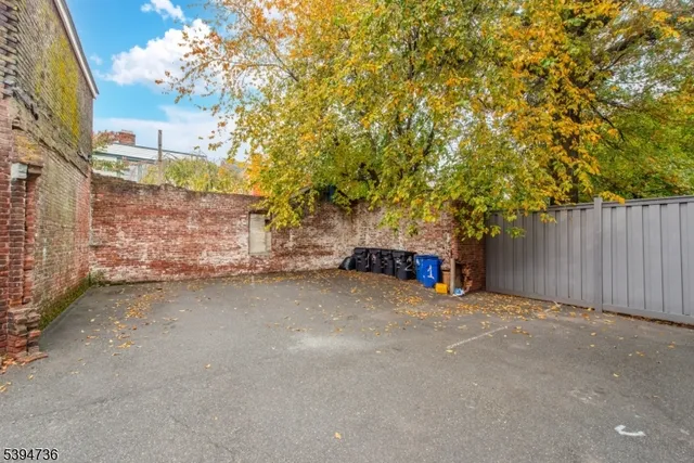 a view of a area with wooden fence