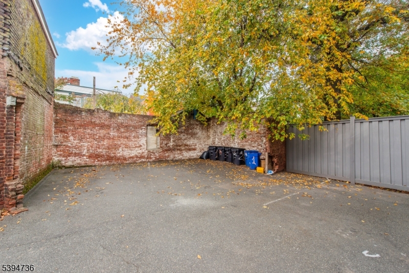 263 South 10th Street Newark, NJ 07103 - Photo 21 of 22 a view of a area with wooden fence