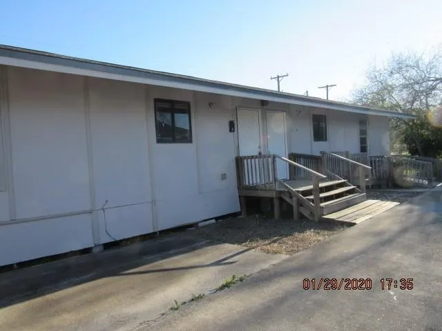 a view of a car garage of a house