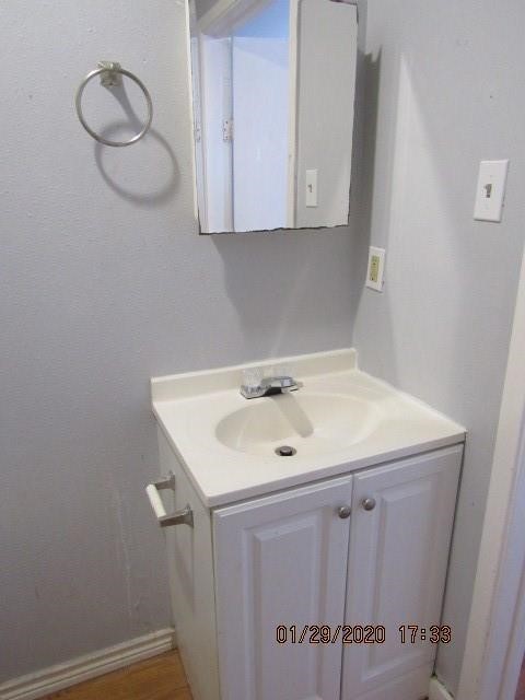 1563 18th Street, Unit A Corpus Christi, TX 78404 - Photo 15 of 15 a bathroom with a sink and mirror