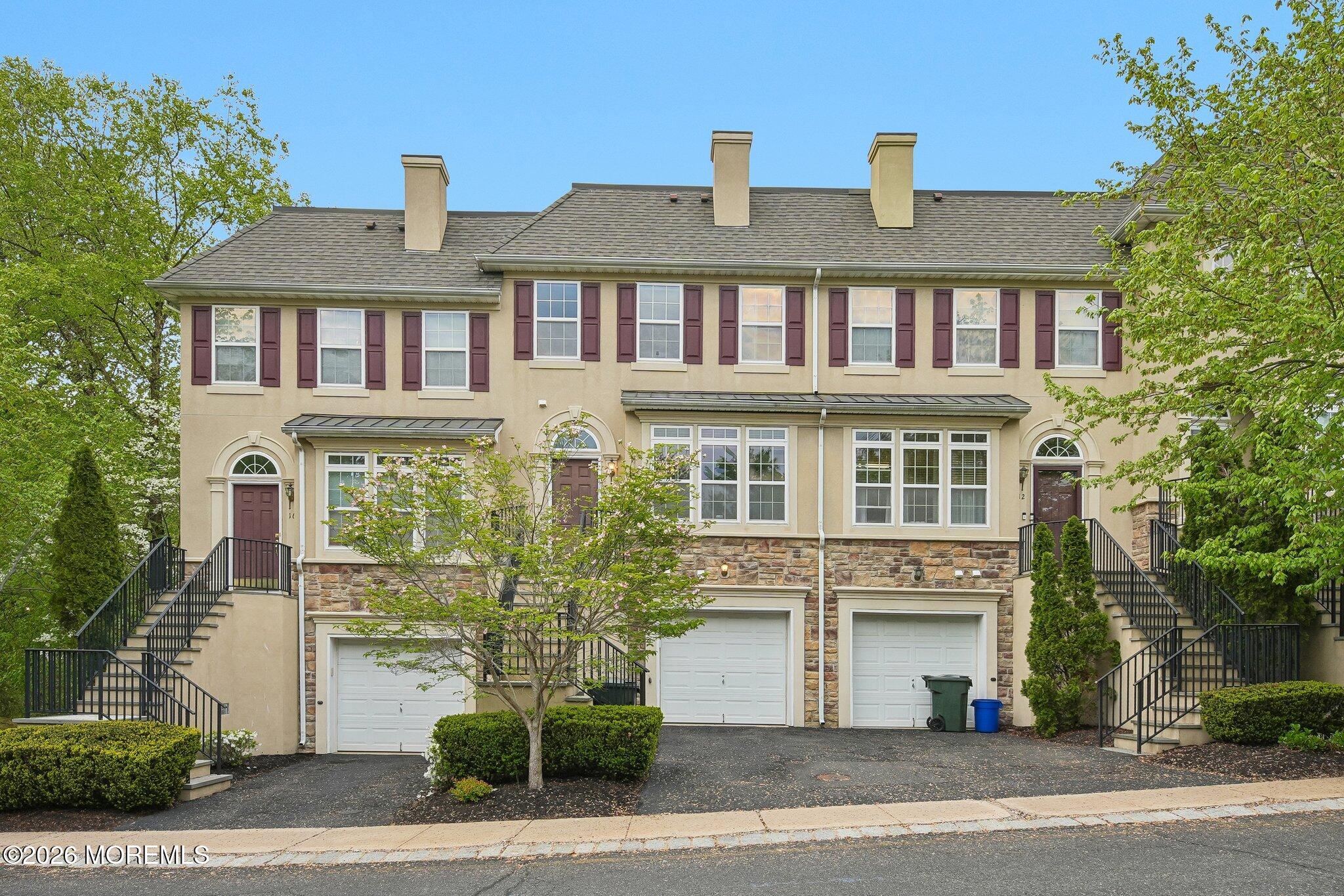 14 West Aspen Way Matawan, NJ 07747 - Photo 1 of 46 front view of a brick house