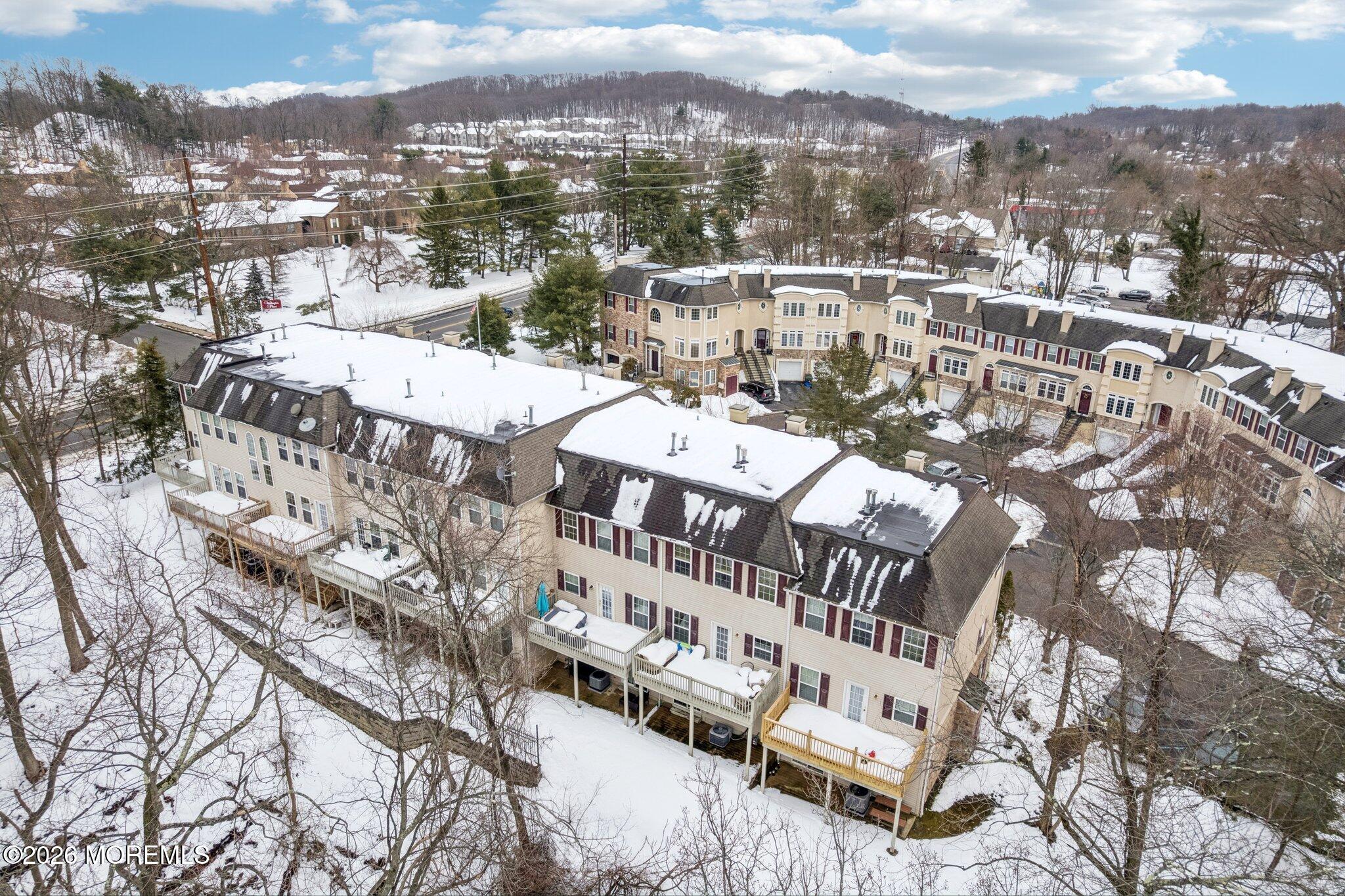14 West Aspen Way Matawan, NJ 07747 - Photo 19 of 42 a view of a city with tall buildings