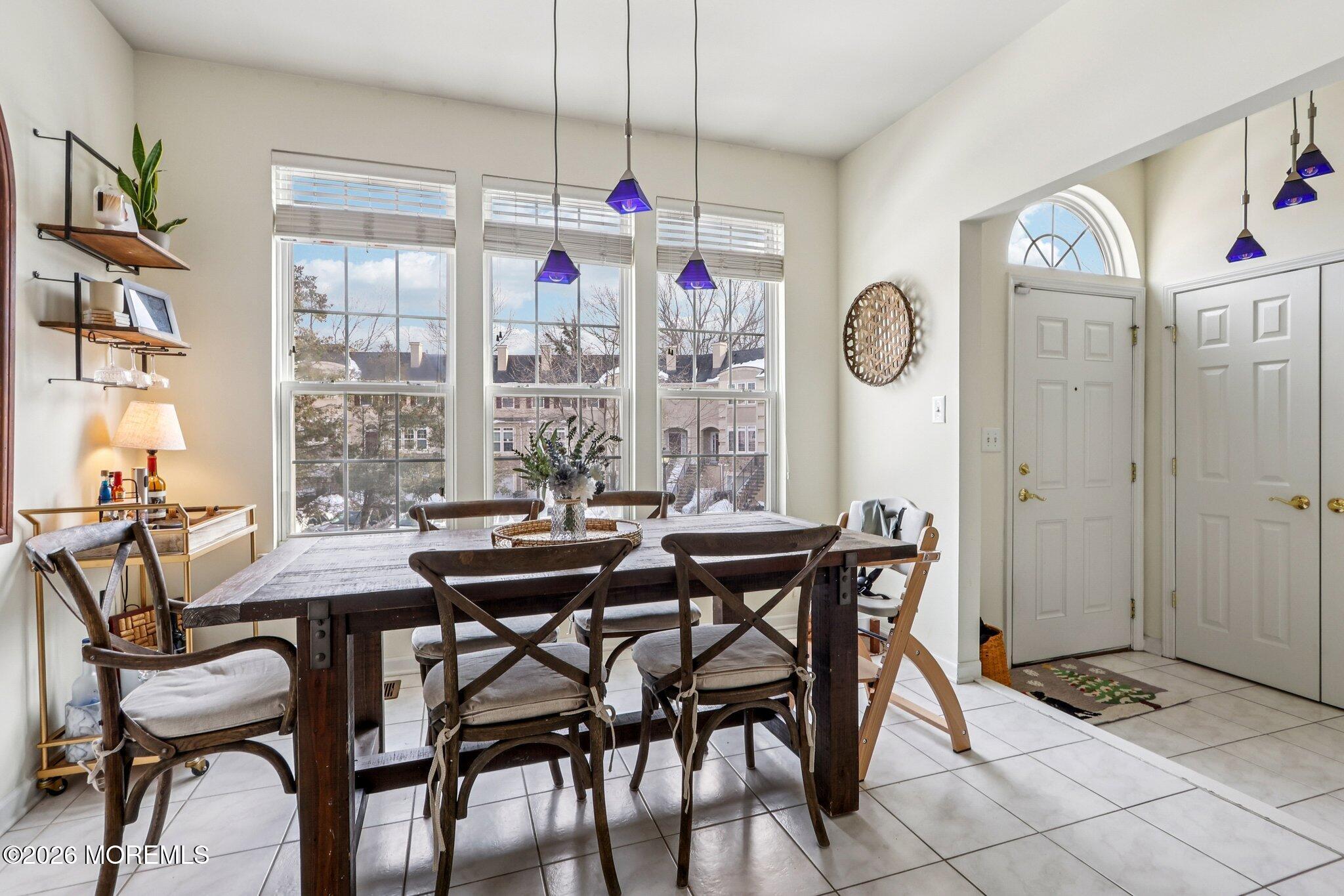 14 West Aspen Way Matawan, NJ 07747 - Photo 2 of 46 a view of a dining room with furniture window and outside view