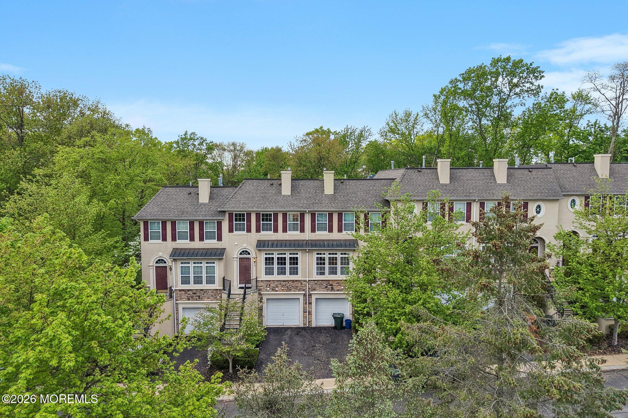 14 West Aspen Way Matawan, NJ 07747 - Photo 30 of 46 aerial view of a house with a yard and potted plants