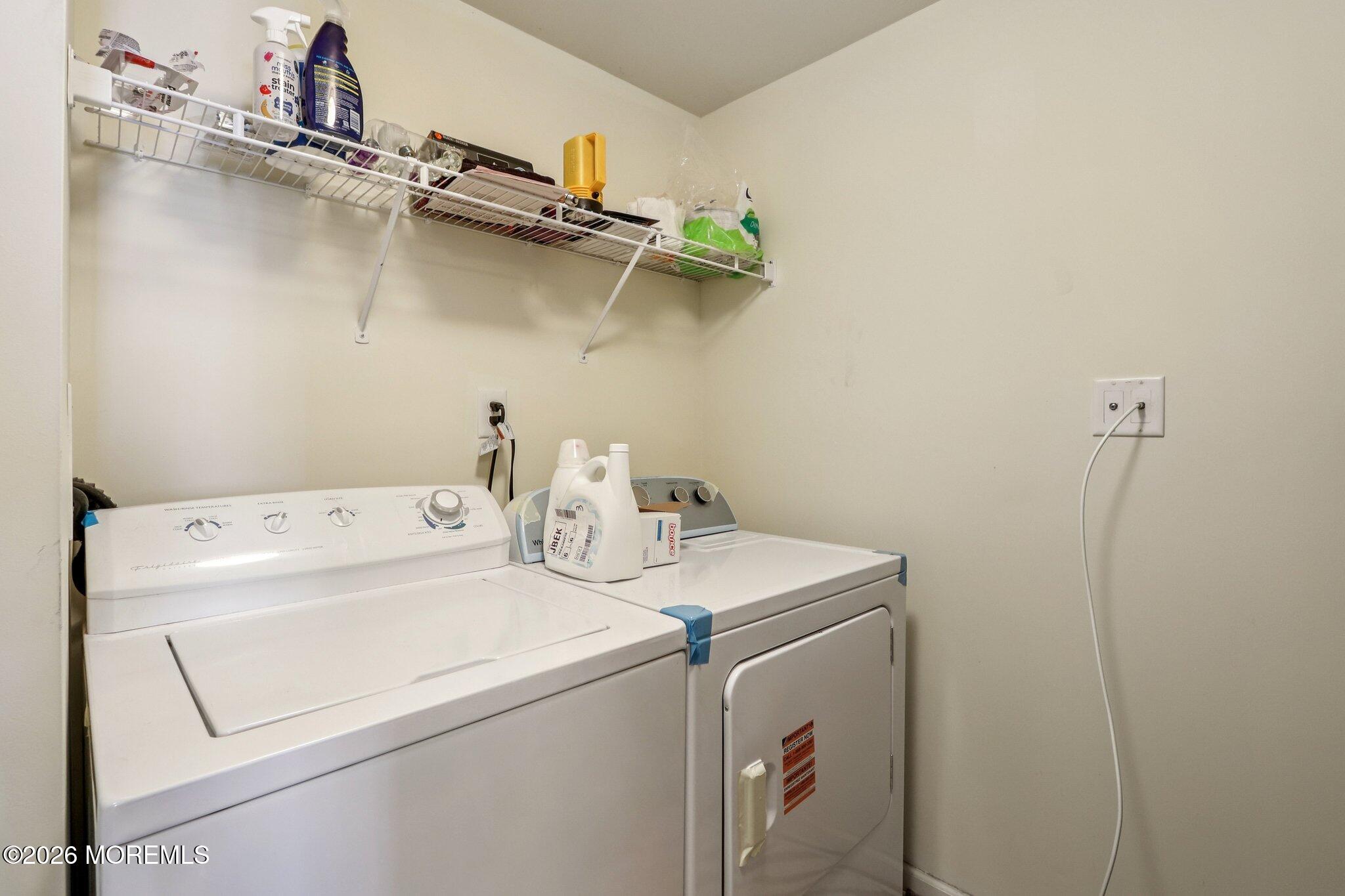 14 West Aspen Way Matawan, NJ 07747 - Photo 35 of 42 a utility room with dryer and washer