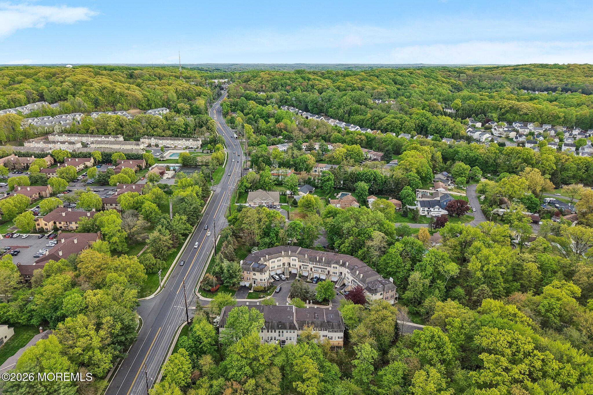 14 West Aspen Way Matawan, NJ 07747 - Photo 42 of 46 an aerial view of a houses with a yard