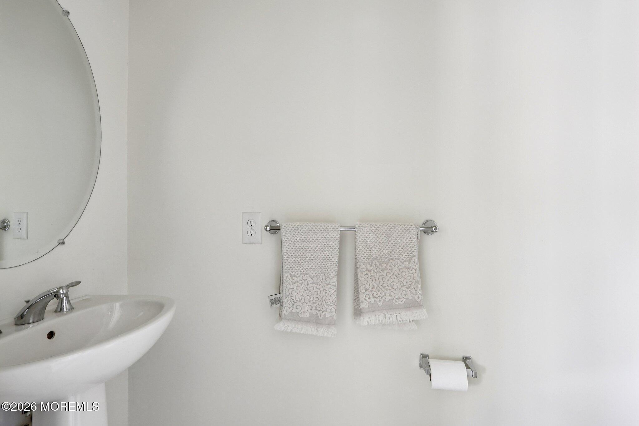 14 West Aspen Way Matawan, NJ 07747 - Photo 10 of 42 a bathroom with a bathtub and a sink