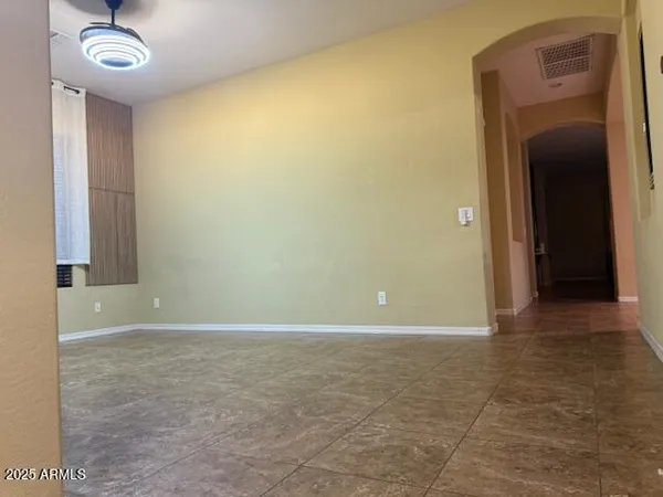 a view of a room with a hallway