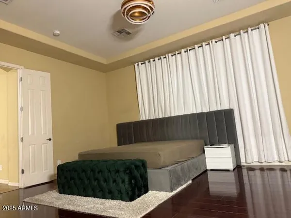 a bathroom with a sink vanity and mirror
