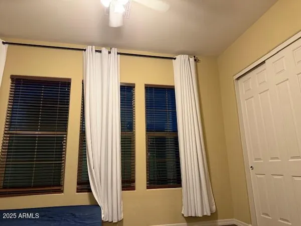 a kitchen with stainless steel appliances granite countertop a sink a stove and refrigerator